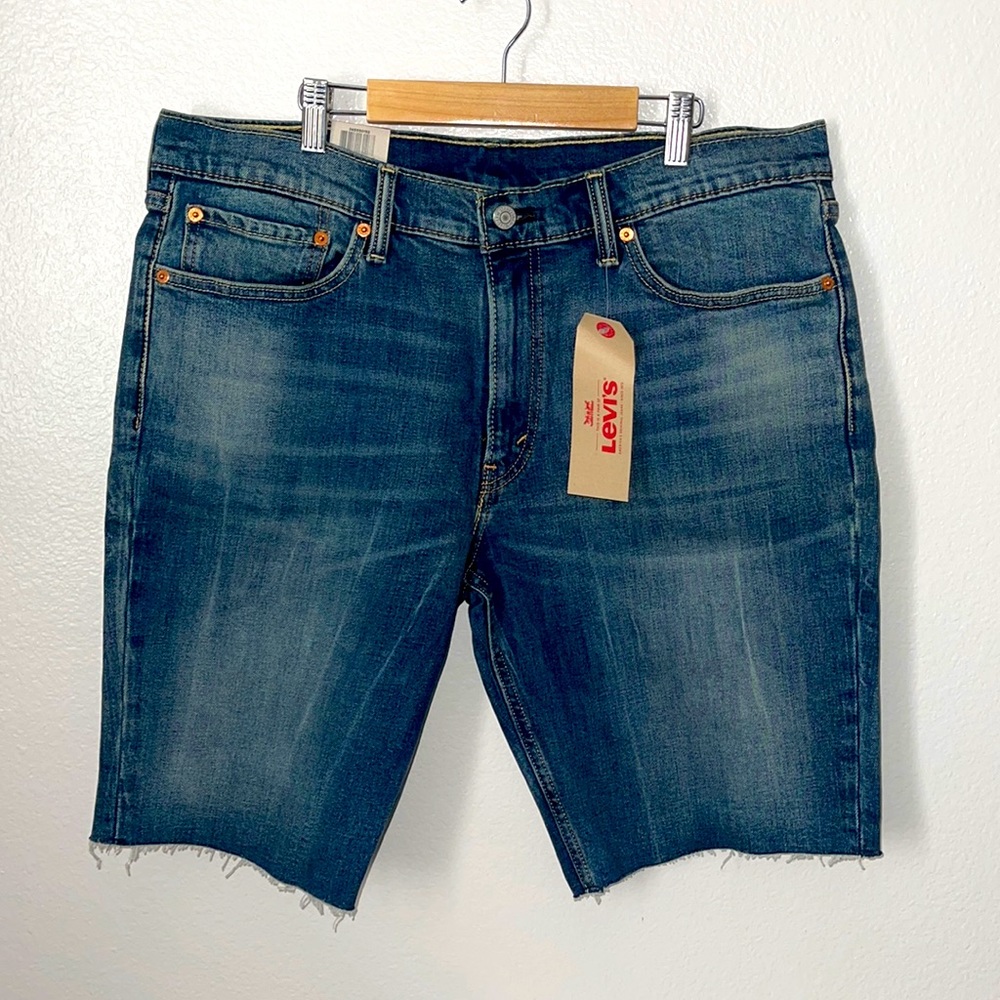 New Levi’s 511 blue wash cut off slim jean shorts NWT 36